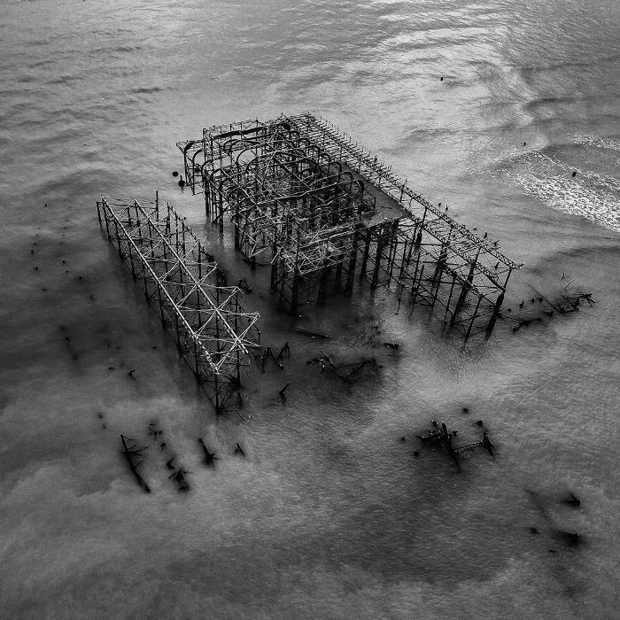 Black and white image of the old brighton pier